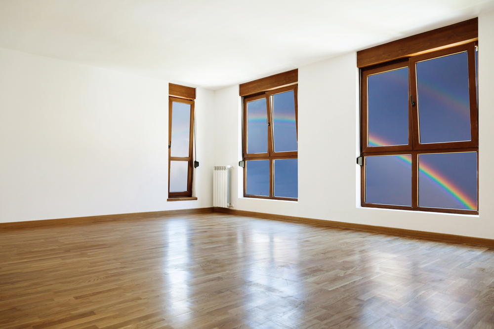 Empty interior room and three windows